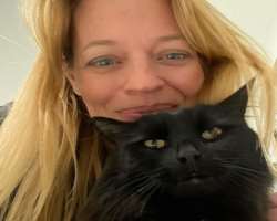 She loves to play with her black cat, Oliver whenever she is at home. She loves to play with her black cat, Oliver whenever she is at home.